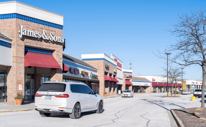 James & Sons and other storefronts at retail shopping center Ravinia Plaza; completed acquisition