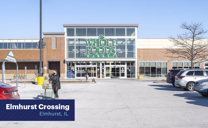 Woman with cart in front of Whole Foods Market in Elmhurst IL