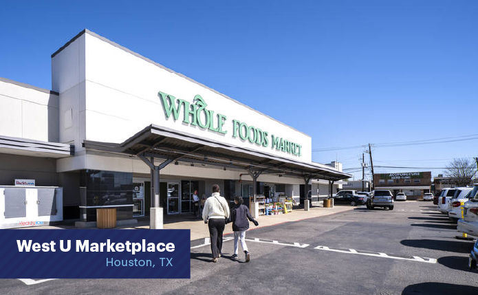 Customers enter Whole Foods Market at West U Marketplace in Houston TX