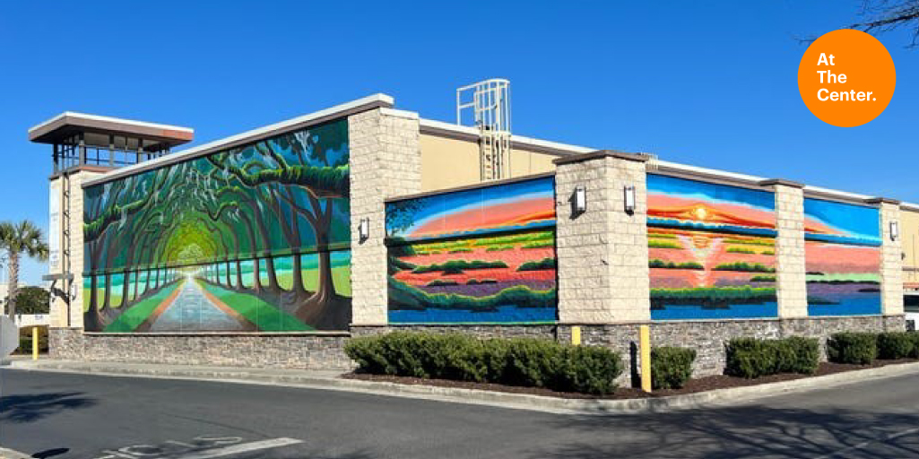 Colorful mural of marsh at Victory Square.