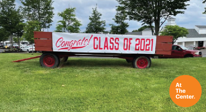 Village at Newtown Congrats Grads 2021 banner on wagon in Newtown PA
