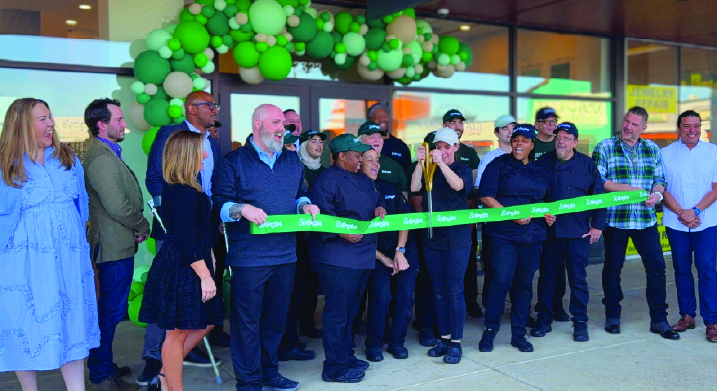 Group at ribbon cutting ceremony for Wonder at Roosevelt Mall.