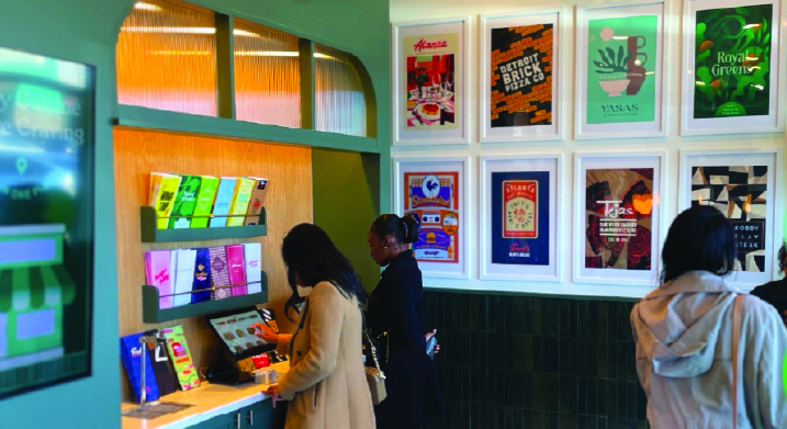 Customers ordering on electronic pad at Wonder store.