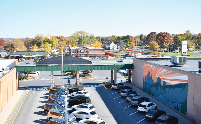 Mural in parking lot honoring the town's steel industry heritage