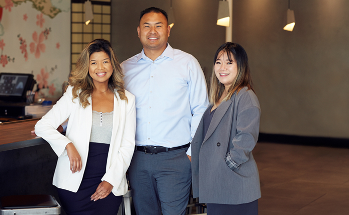Three owners of Little Sakana restaurant
