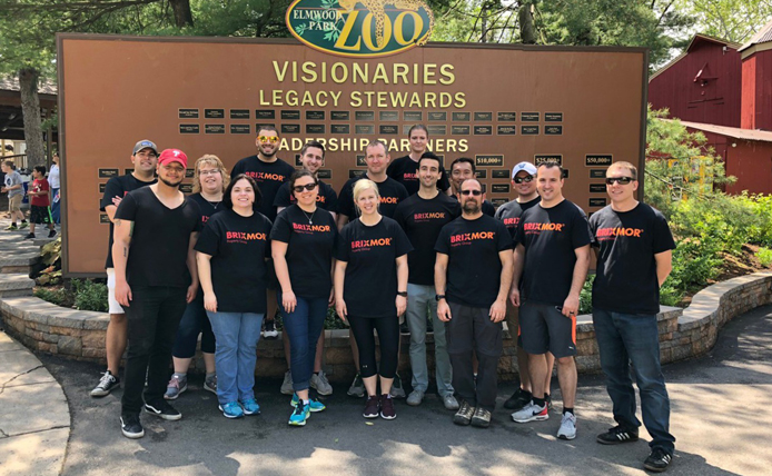 Group of Brixmor volunteers wearing company shirts