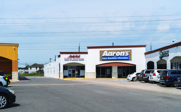 Aaron's and other storefronts in Jones Plaza.