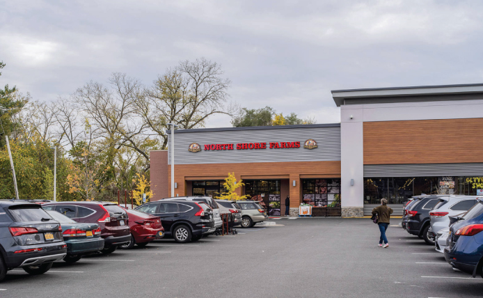 Parking lot view of North Shore Farms at Mamaroneck Centre