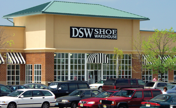 Full parking lot in front of DSW Shoe Warehouse