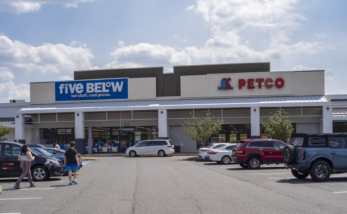 Five Below and Petco parking with customers in foreground.