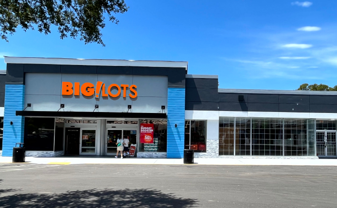 Façade of Big Lots! store with rich blue sky.