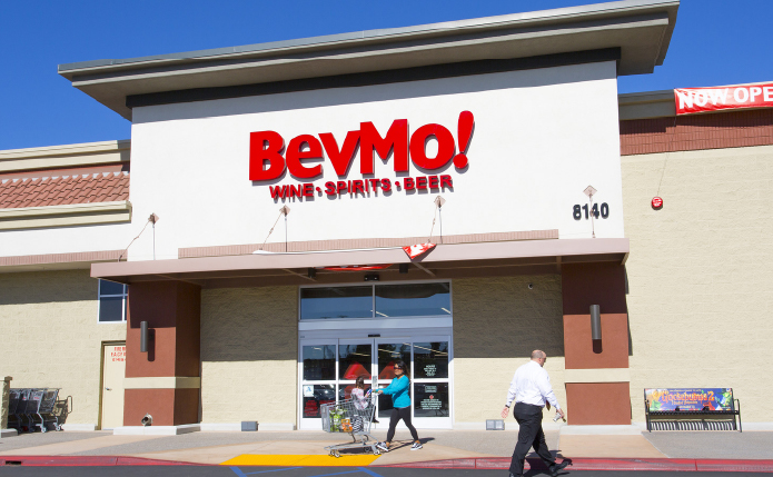 Customers in front of BevMo! storefront.