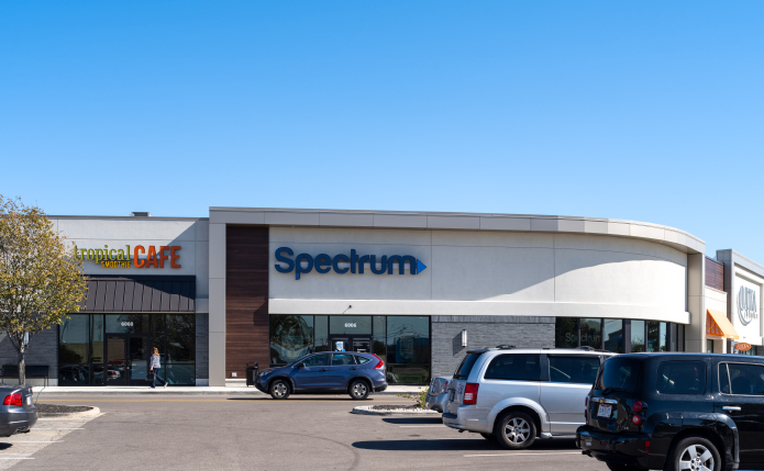 Parked cars in front of Spectrum at Western Hills Plaza shopping center in Cincinnati, Ohio