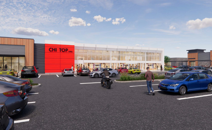 Rendering of parking lot at red storefront in shopping center.