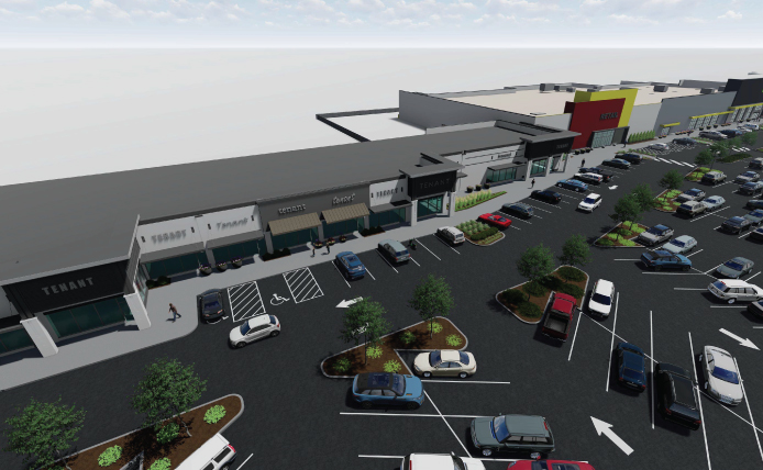 Bird's eye view of parking lot in front of small shop spaces at Tinley Park Plaza