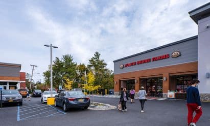 North Shore Farms storefront at Mamaroneck Centre in Mamaroneck, NY featuring a redesigned façade, modern architectural detailing, and improved pedestrian access following the shopping center redevelopment.