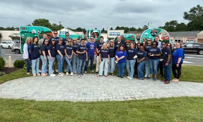 Celebrating with Fox 29 News on the unveiling of a sign honoring Delaware County landmarks at Pilgrim Gardens