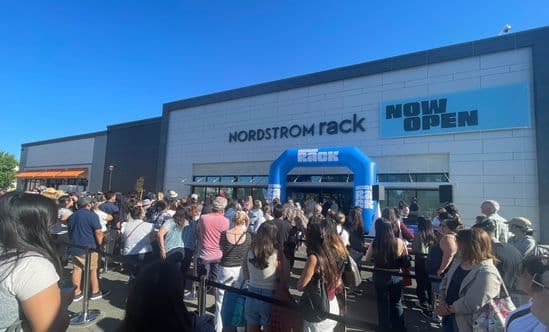 crowd of people outside the grand opening of Nordstrom Rack at The Davis Collection