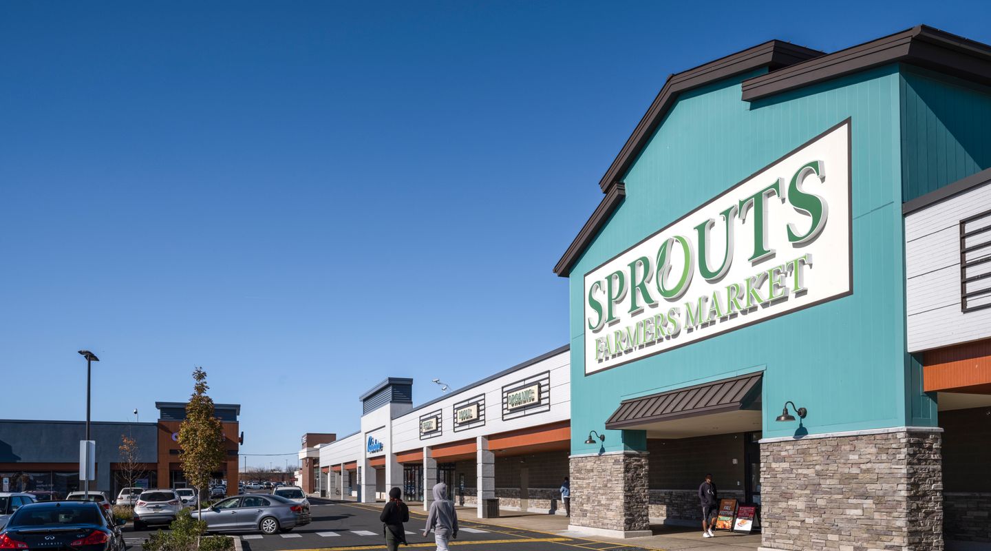 Sprouts Farmers Market at Roosevelt Mall in Philadelphia, PA showcasing the new grocer anchor, refreshed façade, improved pedestrian crosswalks, and upgraded site design following redevelopment.