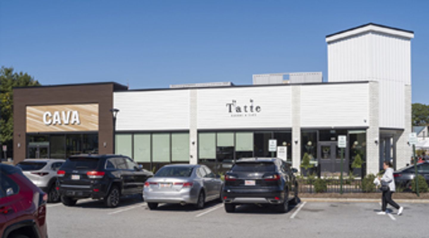 CAVA and Tatte Bakery & Café storefronts at Burlington Square in Burlington, MA, featuring a modern retail center façade and a busy parking area at this high‑traffic shopping plaza.