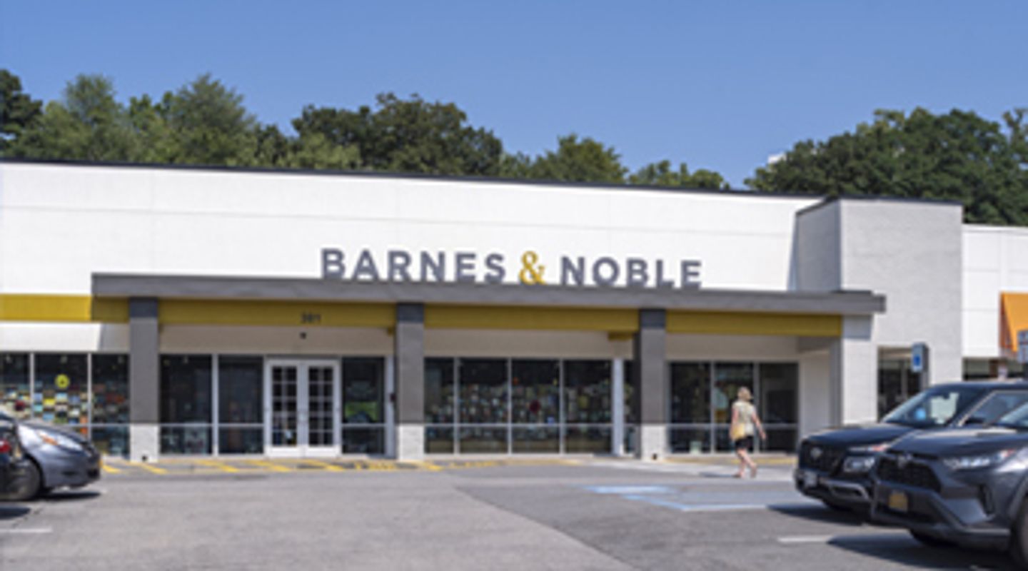 Barnes & Noble bookstore at Dalewood Shopping Center in Hartsdale, NY, with a wide storefront, large display windows, yellow accent canopy, and parking spaces directly in front of the entrance.