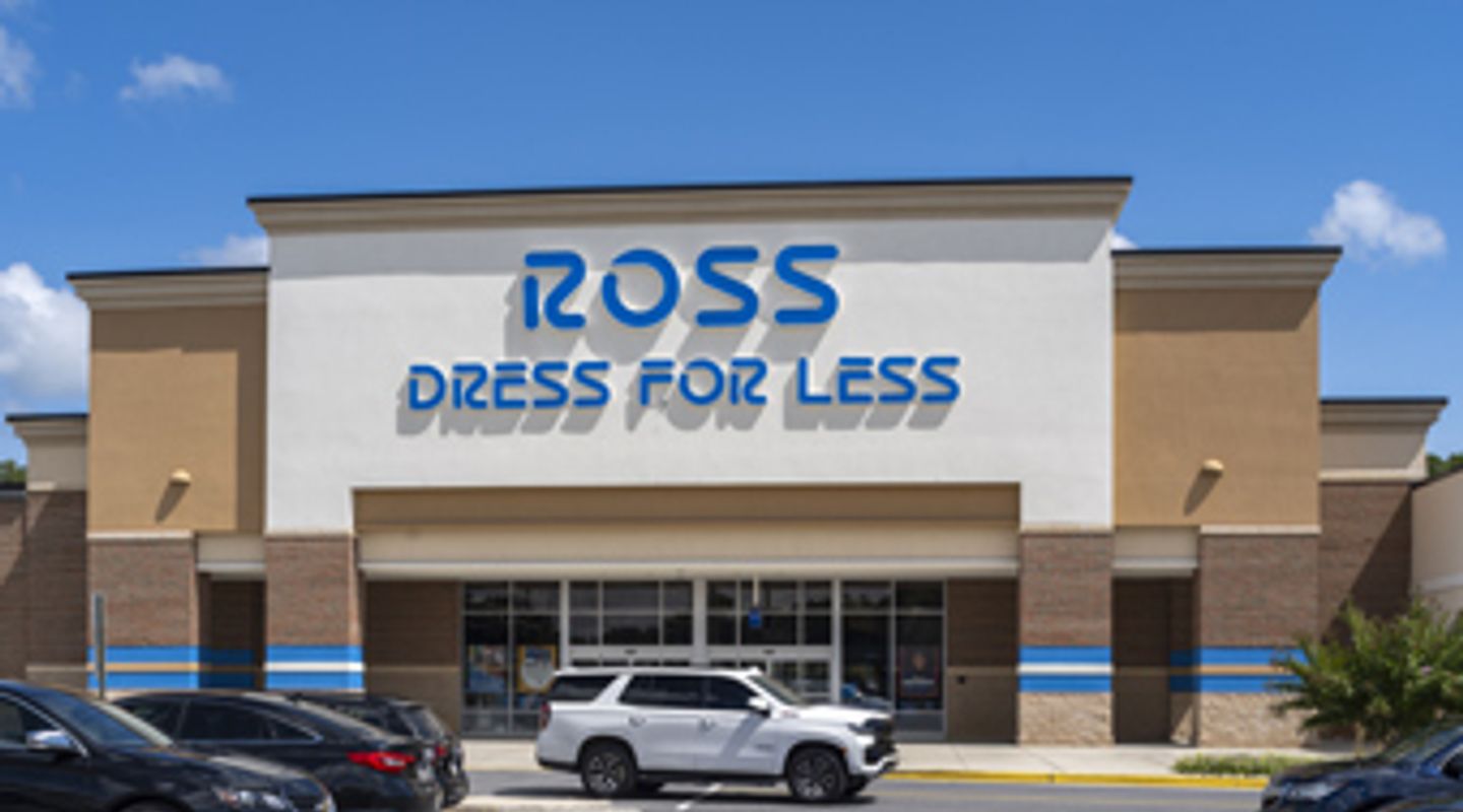 Ross Dress for Less storefront at Fox Run in Prince Frederick, MD, featuring a modern façade with brick and stucco finishes, clear glass entryway, and active parking in front of the retail entrance under a bright blue sky.