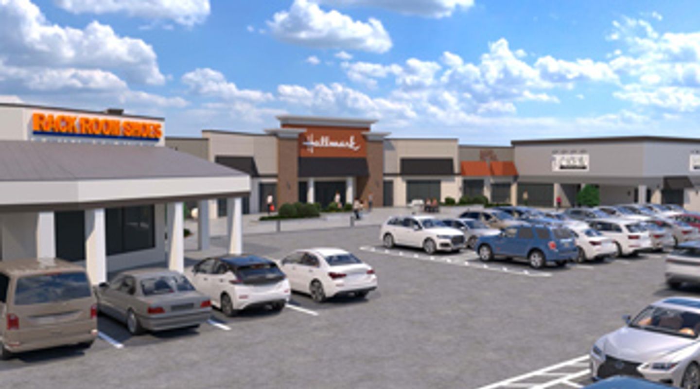 3D perspective rendering of Hillcrest Market Place in Spartanburg, SC, showing proposed façade upgrades for Hallmark, Rack Room Shoes, and J.Crew Factory, with enhanced architectural details, expanded storefront glass, new signage, and an active parking lot in the foreground.