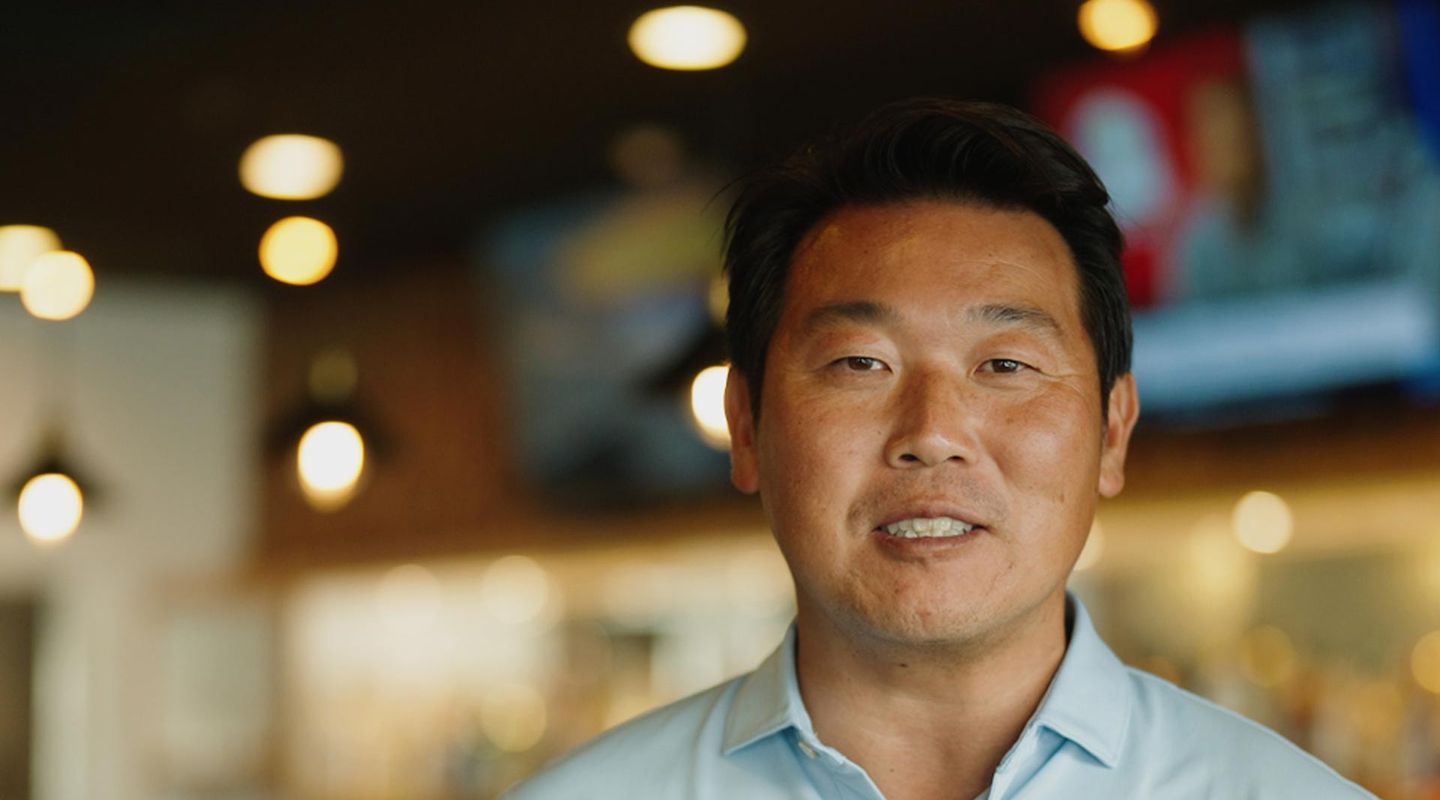 Oishi restaurant owner John Im inside his restaurant