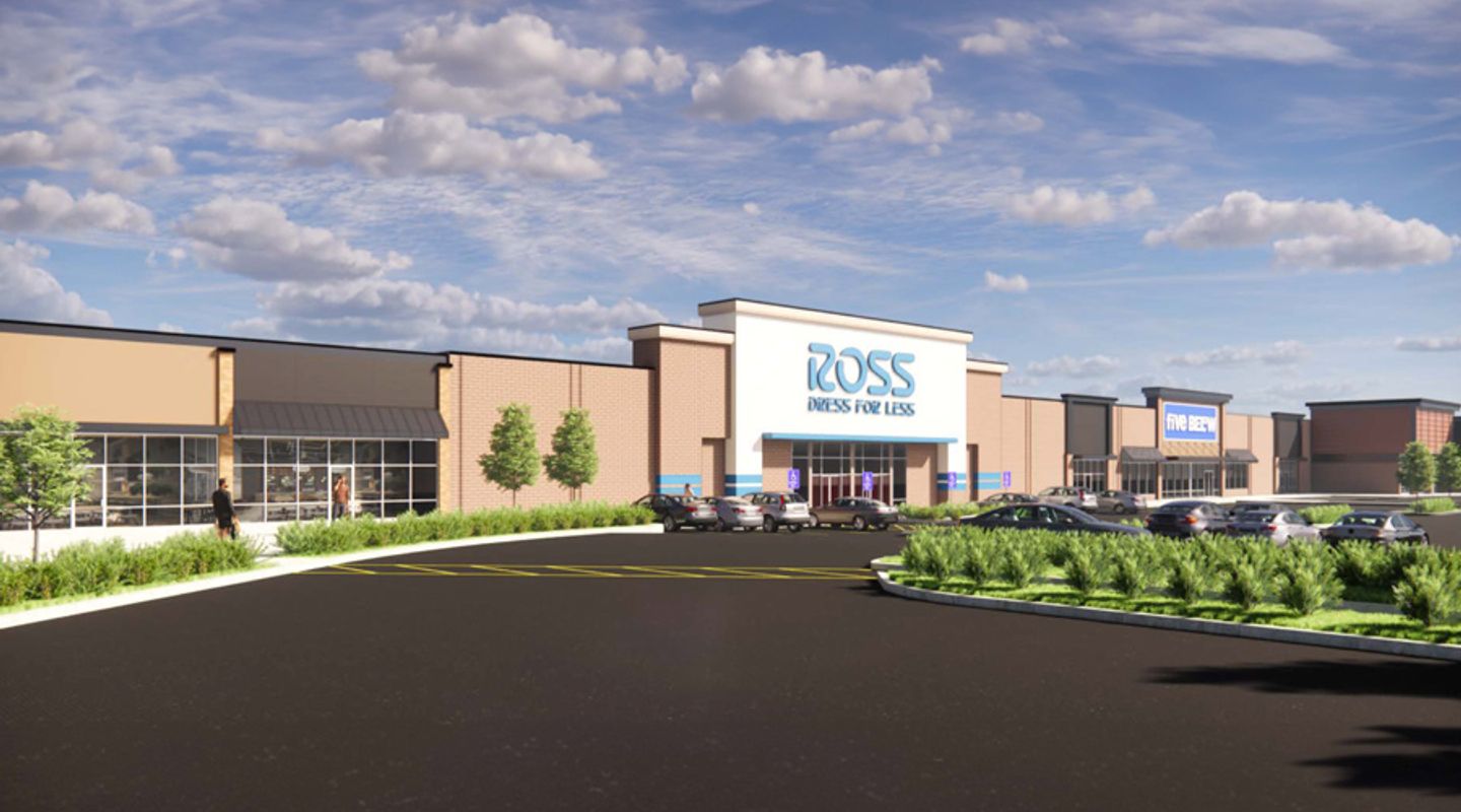 Rendering of Ross Dress for Less at Tinley Park Plaza in Tinley Park, IL, featuring a modernized façade with tan and white architectural elements, blue accent panels, landscaped walkways, and adjacent inline retail spaces set behind a large parking field under a partly cloudy sky.